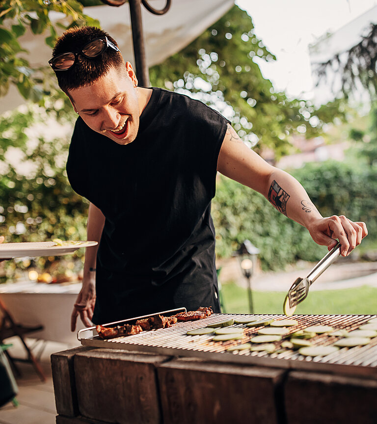 Man Preparing a Barbecue